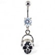 Navel ring with dangling skull with headphones